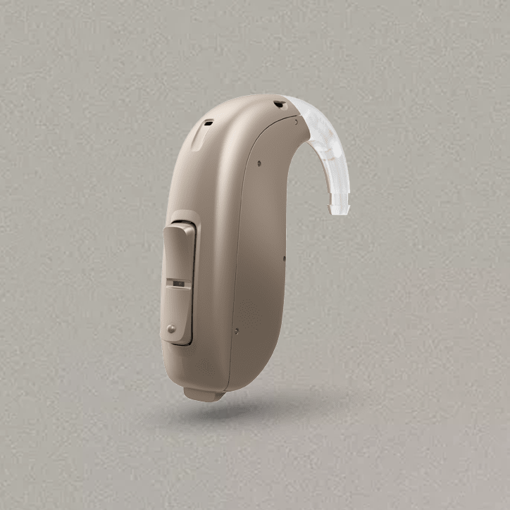 Beige behind-the-ear style hearing aid.